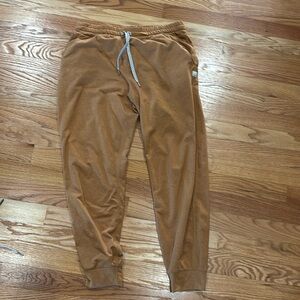 Vuori performance joggers size small. Mustard